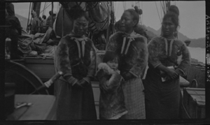 Image of Three Inuit women and children aboard